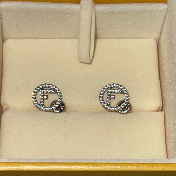 Fendi Jewelry - Preloved Fendi earrings excellent condition in silver very shiny .